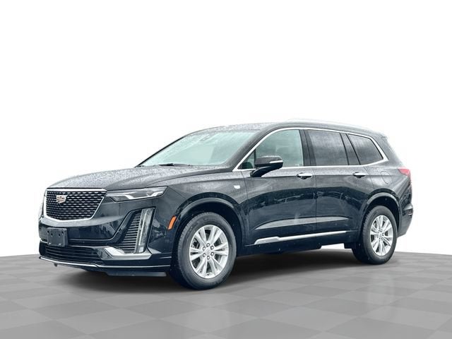 2023 Cadillac XT6 Luxury in Stellar Black Metallic — front three-quarter view