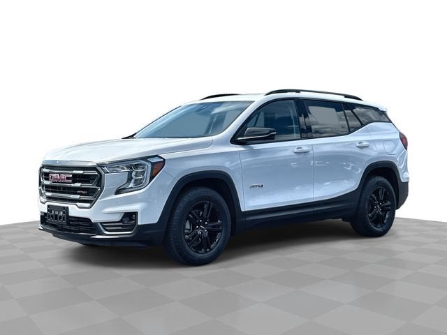 2024 GMC Terrain AT4 in Summit White — front three-quarter view