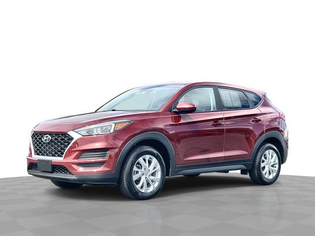 2019 Hyundai Tucson SE in Red — front three-quarter view